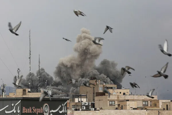 US-Israeli Airstrike Damages IRGC Headquarters Amid Escalating Regional Conflict