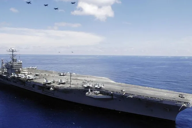U.S. Carrier Abraham Lincoln Intensifies Operations in Persian Gulf as Iran Claims Missile Strikes