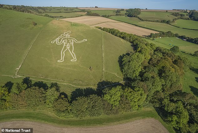 Experts restore Britain's iconic Cerne Abbas Giant with 17 tonnes of chalk.