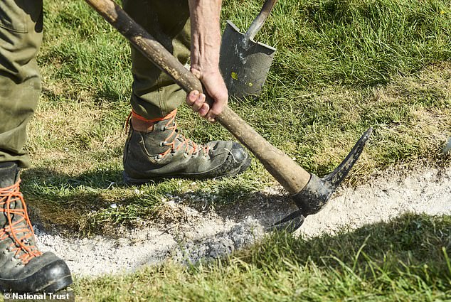Experts restore Britain's iconic Cerne Abbas Giant with 17 tonnes of chalk.