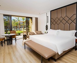 Morocco resort solves "golf widow" with luxury spa for mothers.